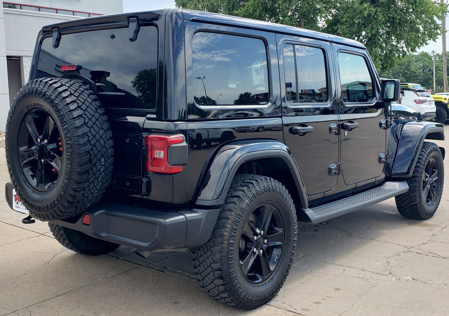 Used 2020 Jeep Wrangler Unlimited Sahara Altitude with VIN 1C4HJXEG2LW119006 for sale in Columbus, NE