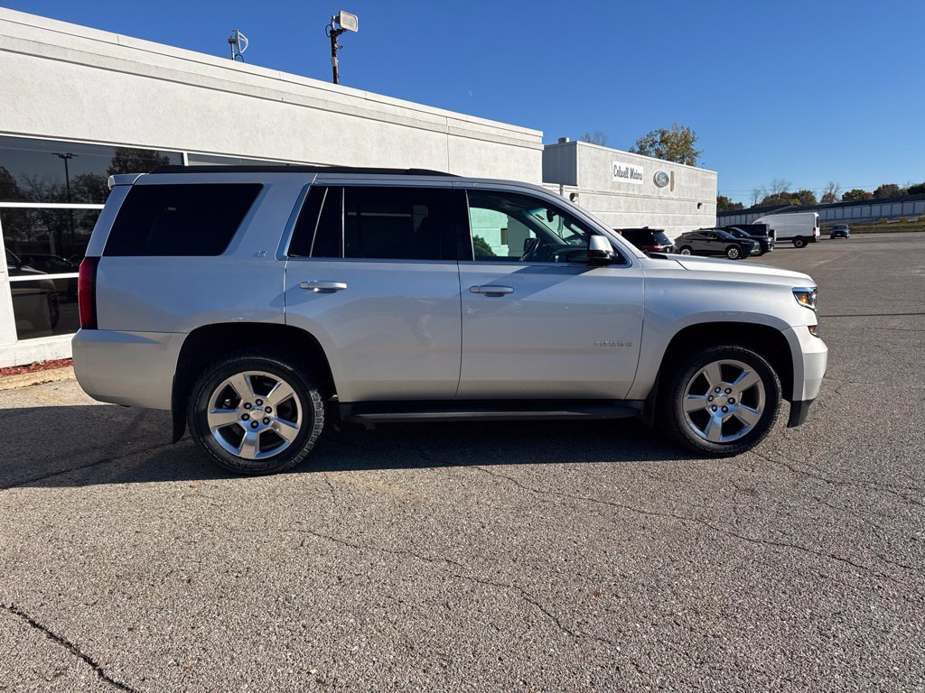 Used 2015 Chevrolet Tahoe LT with VIN 1GNSKBKC9FR233120 for sale in Mason City, IA