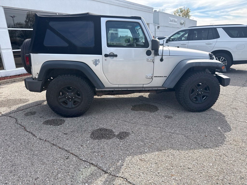 Used 2012 Jeep Wrangler Sport with VIN 1C4AJWAG6CL147166 for sale in Mason City, IA