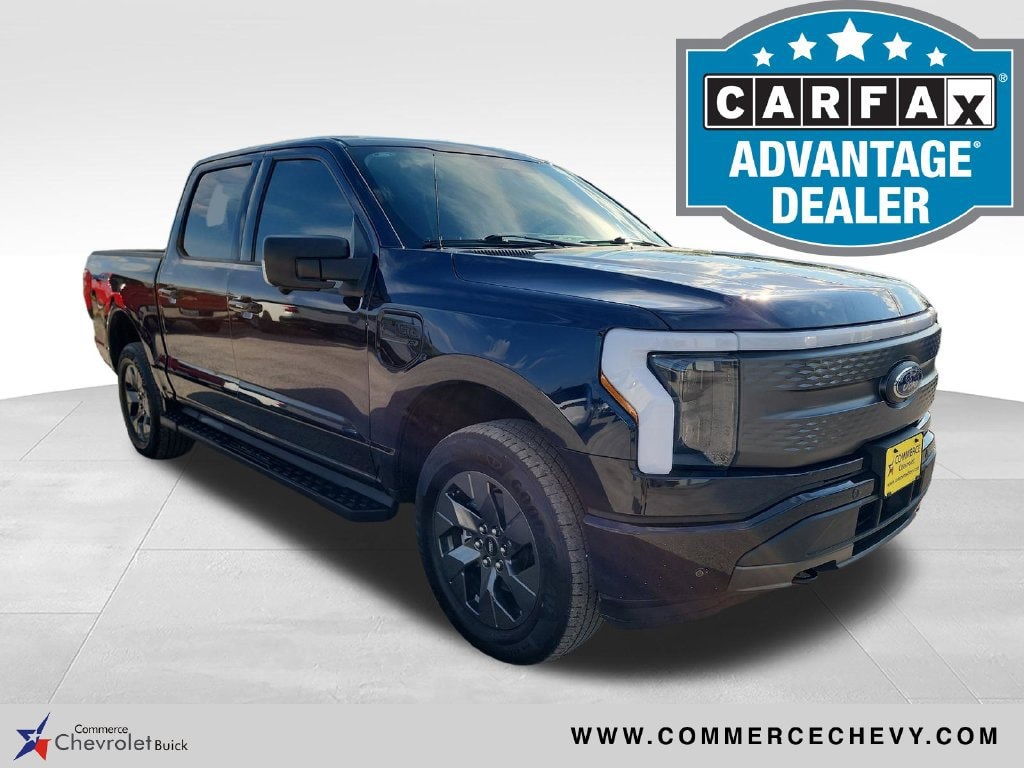 Used 2023 Ford F-150 Lightning XLT with VIN 1FTVW1EL7PWG40128 for sale in Commerce, TX