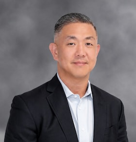 Staff member Scott Son from ID_52d8cd