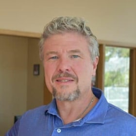 Staff member Travis Bailey from ID_33d8ac37686c