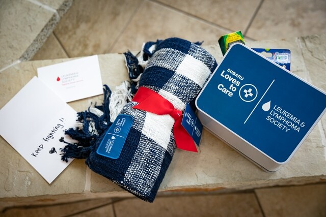 Blankets-and-messages-gathered-for-the-Subaru-Loves-to-Care-initiative.jpg