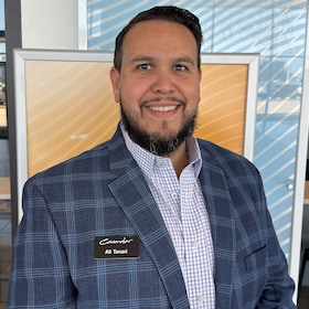 Staff member Ali Tanari from e0ecea890464