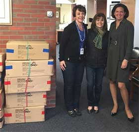 Donna Conicelli delivers new winter coats for school kids at Norristown Area School District.