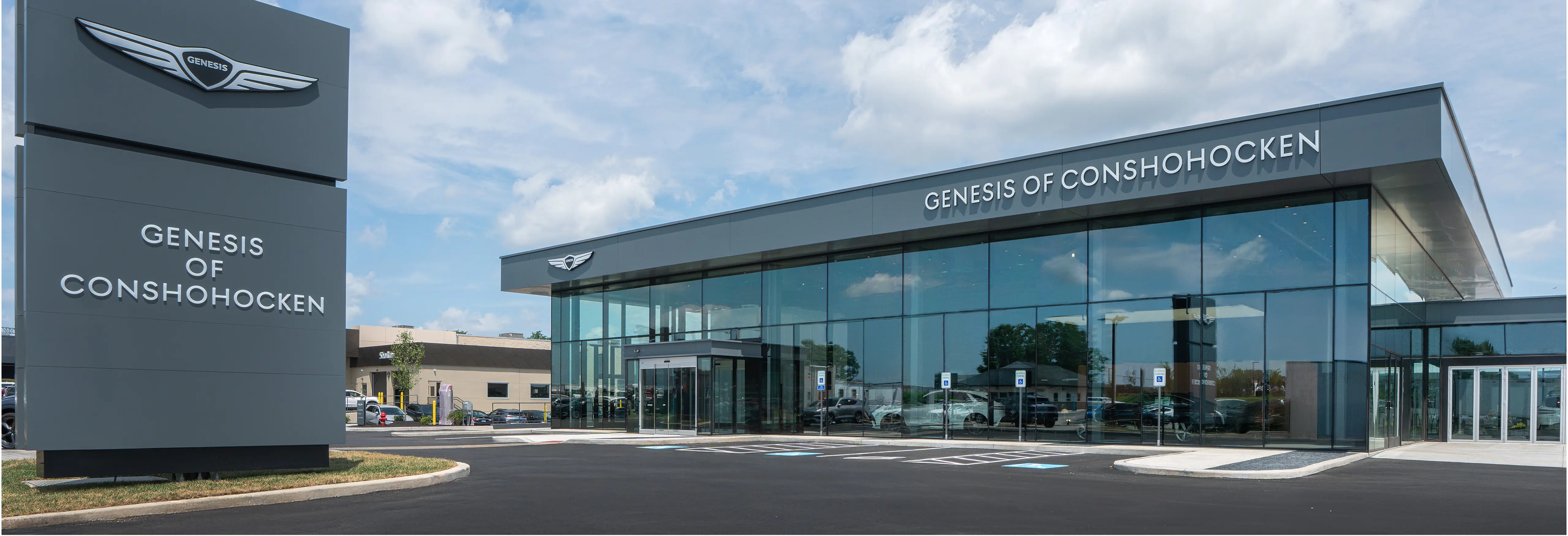 An all-new glass-enclosed showroom and service area at Genesis of Conshohocken