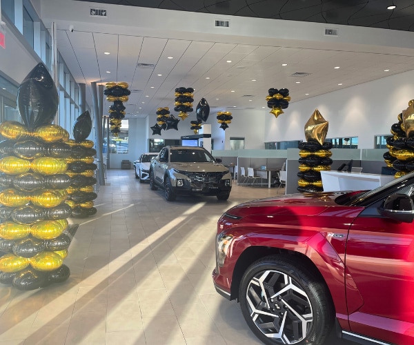 Fresh New Showroom filled with Cars and Balloons