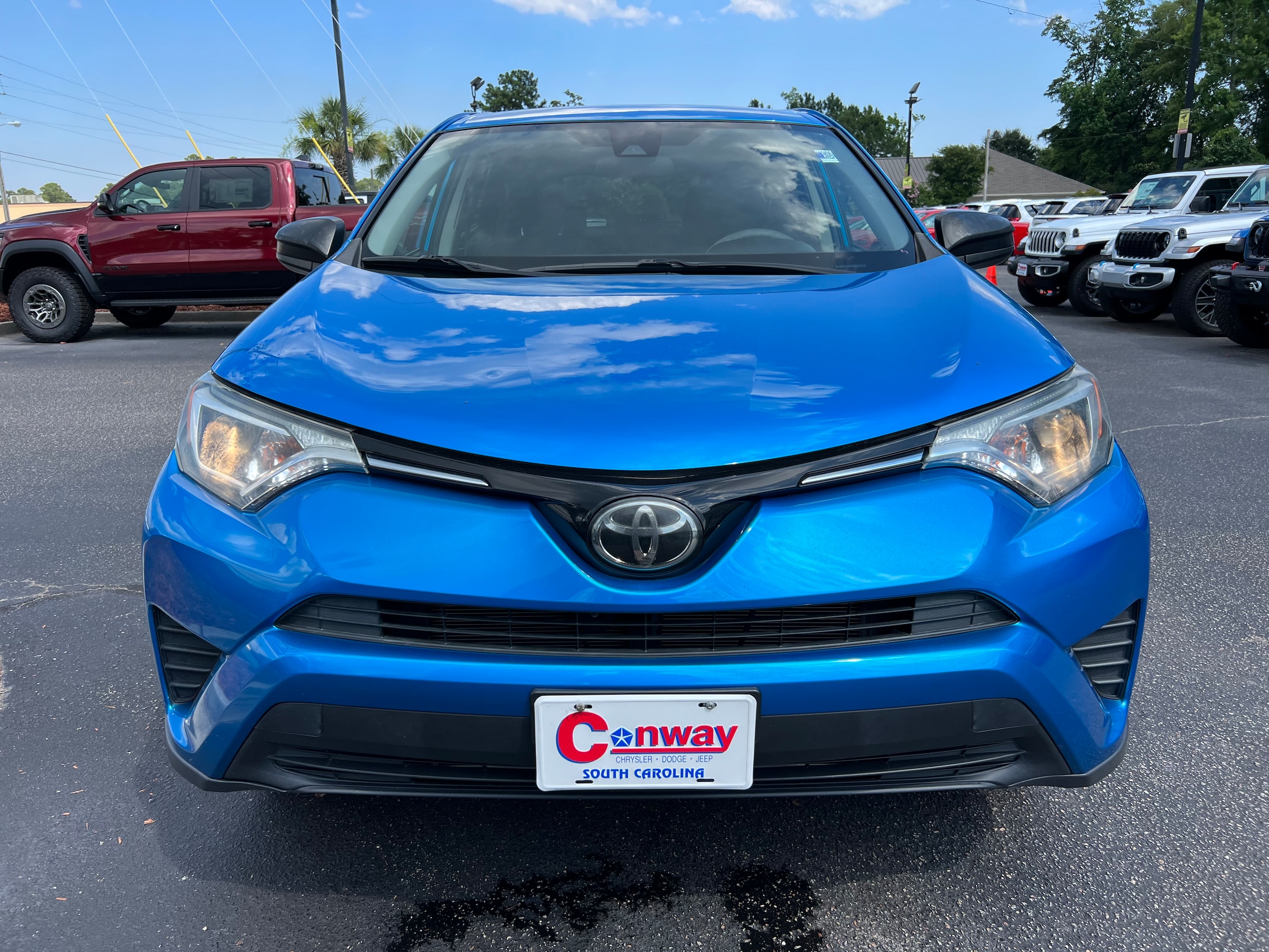 Certified 2018 Toyota RAV4 LE with VIN JTMBFREV0JD230356 for sale in Conway, SC