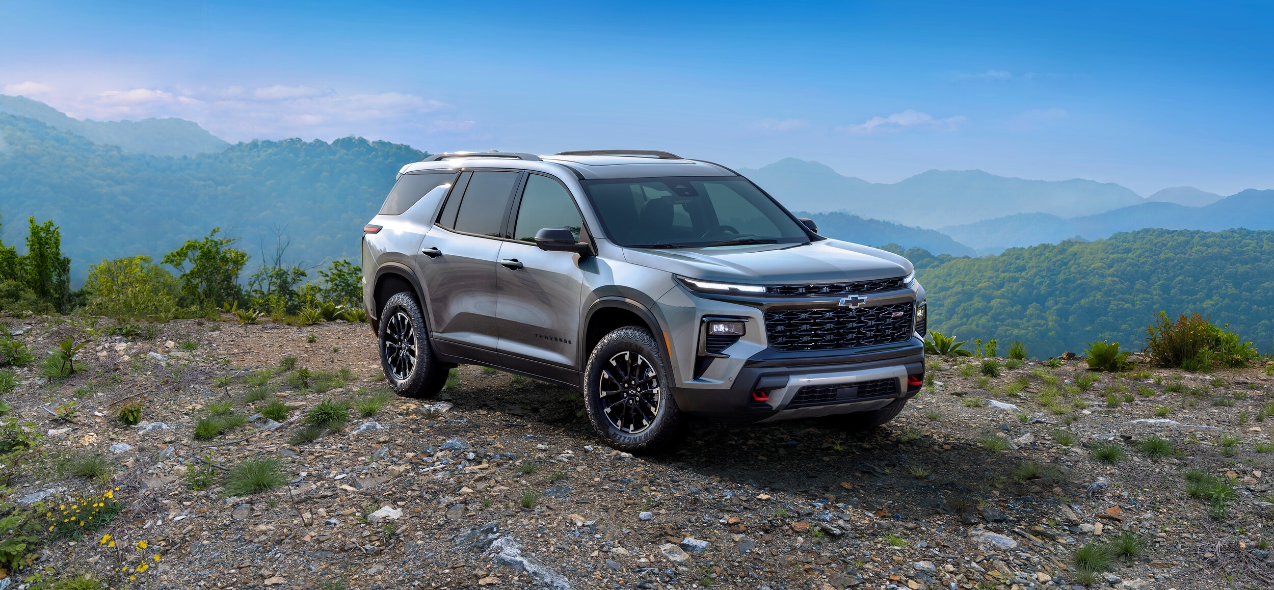 Silver Chevrolet Traverse parked at lookout