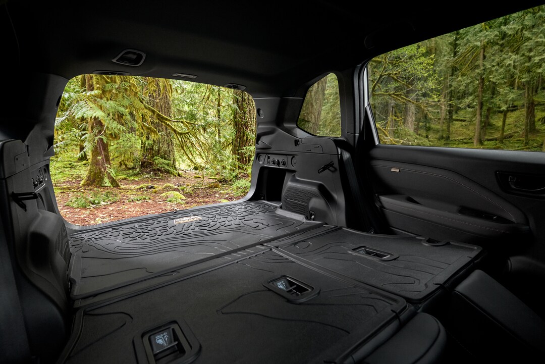 Blue Subaru Forester Wilderness at house in woods