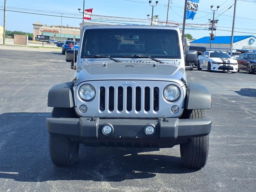 Used 2014 Jeep Wrangler Unlimited Sport with VIN 1C4BJWDG0EL313507 for sale in Tiffin, OH