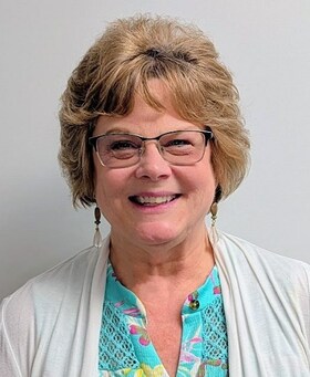 Staff member Karen Cost from ID_8070580b779f