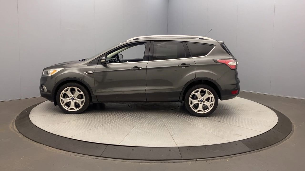 Used 2017 Ford Escape Titanium with VIN 1FMCU0J91HUB22929 for sale in Rochester, NY