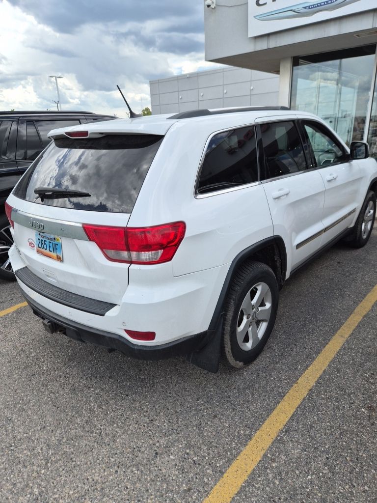 Used 2013 Jeep Grand Cherokee Laredo X with VIN 1C4RJFAG9DC610261 for sale in Fargo, ND