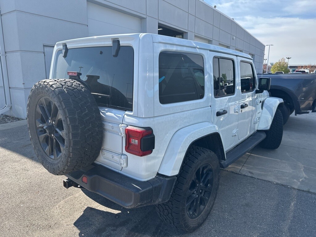 Used 2021 Jeep Wrangler Unlimited Sahara 4XE with VIN 1C4JJXP69MW642353 for sale in Fargo, ND