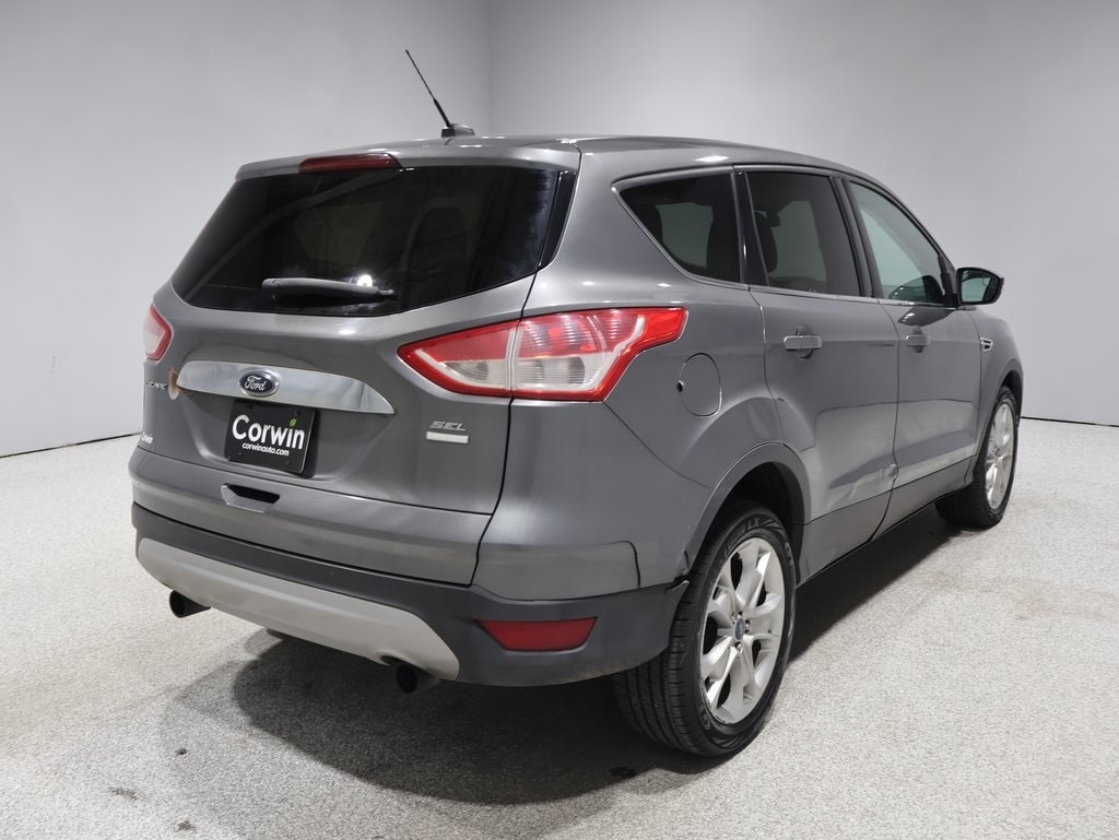 Used 2013 Ford Escape SEL with VIN 1FMCU9H99DUA74679 for sale in Fargo, ND