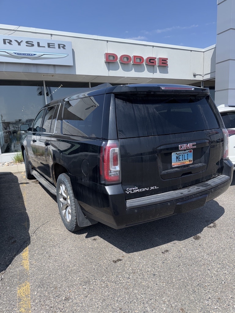 Used 2015 GMC Yukon XL SLT with VIN 1GKS2HKC4FR133569 for sale in Fargo, ND