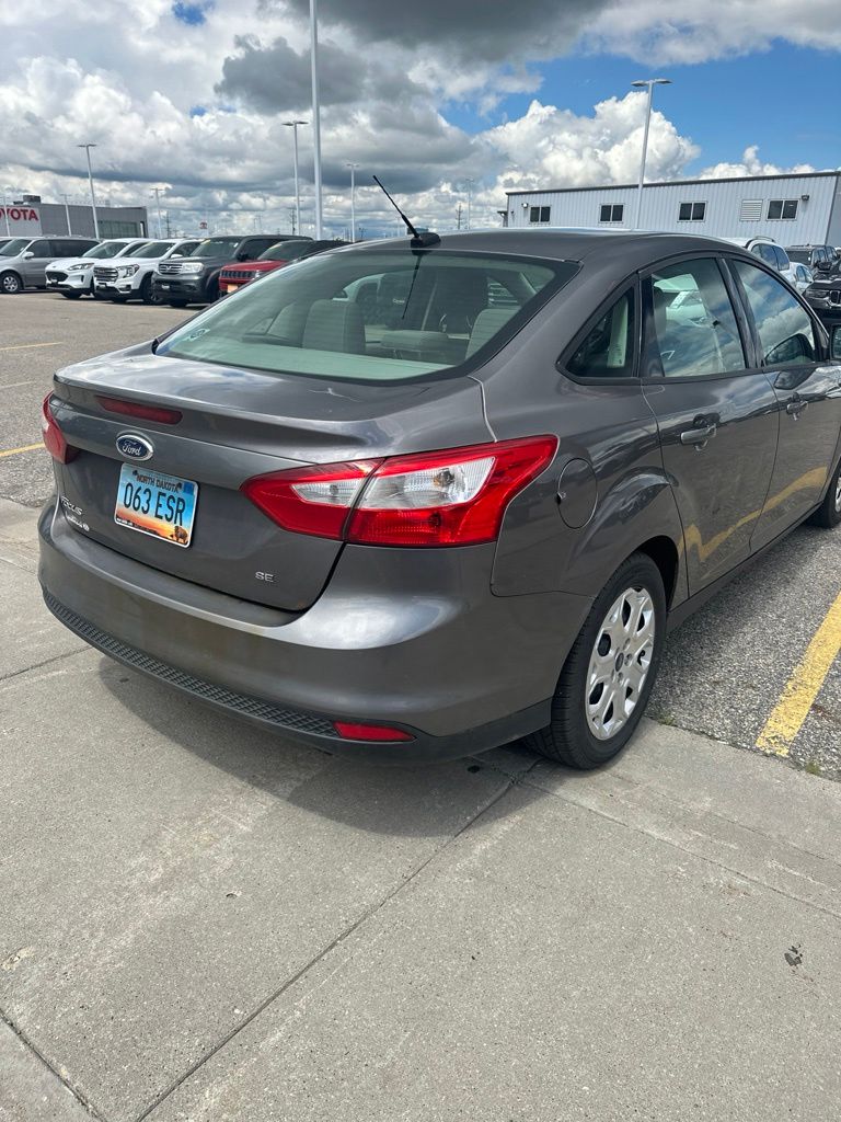 Used 2012 Ford Focus SE with VIN 1FAHP3F2XCL248337 for sale in Fargo, ND
