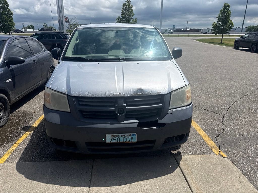 Used 2009 Dodge Grand Caravan SE with VIN 2D8HN44EX9R666532 for sale in Fargo, ND