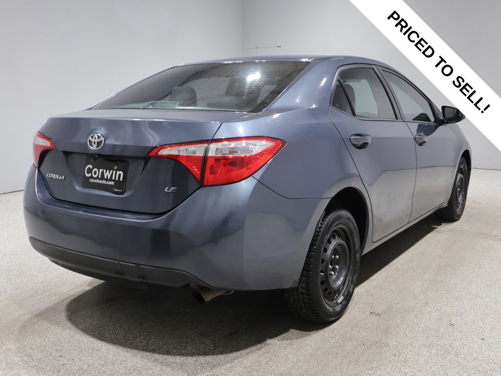 Used 2014 Toyota Corolla LE with VIN 2T1BURHE7EC120859 for sale in Fargo, ND