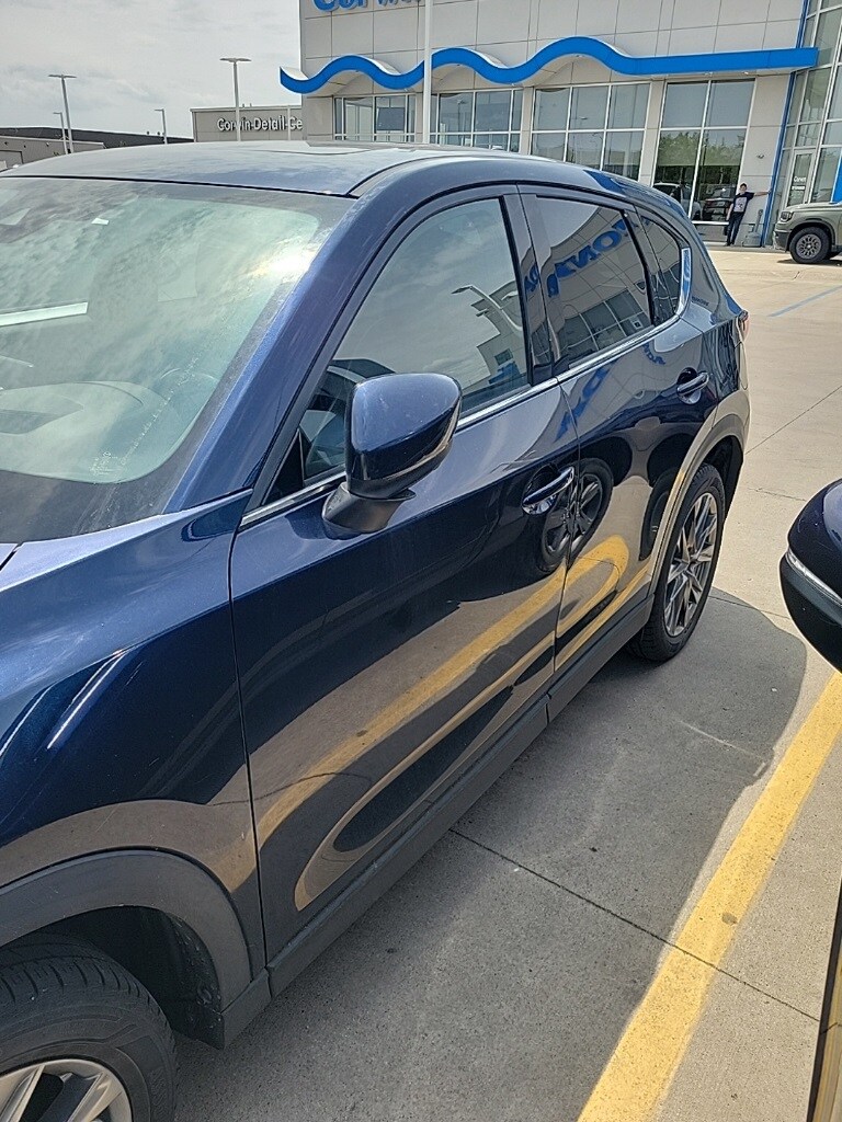 Used 2021 Mazda CX-5 Signature with VIN JM3KFBEYXM0458255 for sale in Fargo, ND
