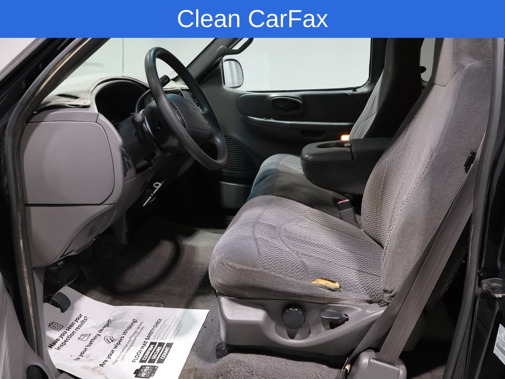 Used 1999 Ford F-150 XLT with VIN 2FTRX18LXXCA25871 for sale in Fargo, ND