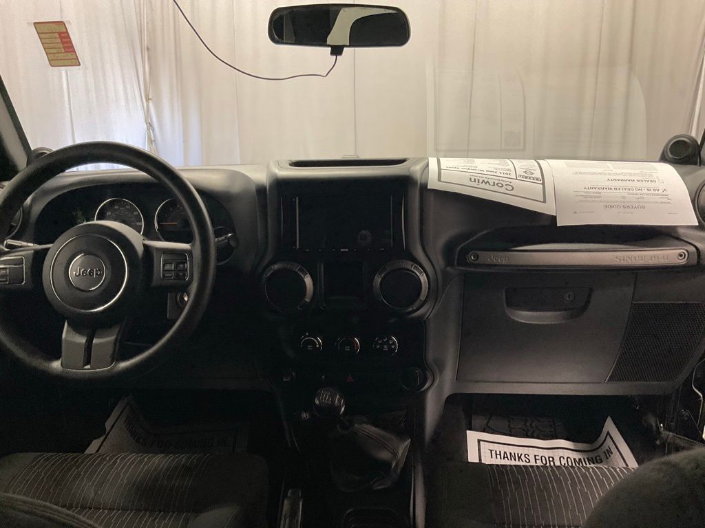 Used 2011 Jeep Wrangler Sport with VIN 1J4AA2D15BL619611 for sale in Moorhead, Minnesota