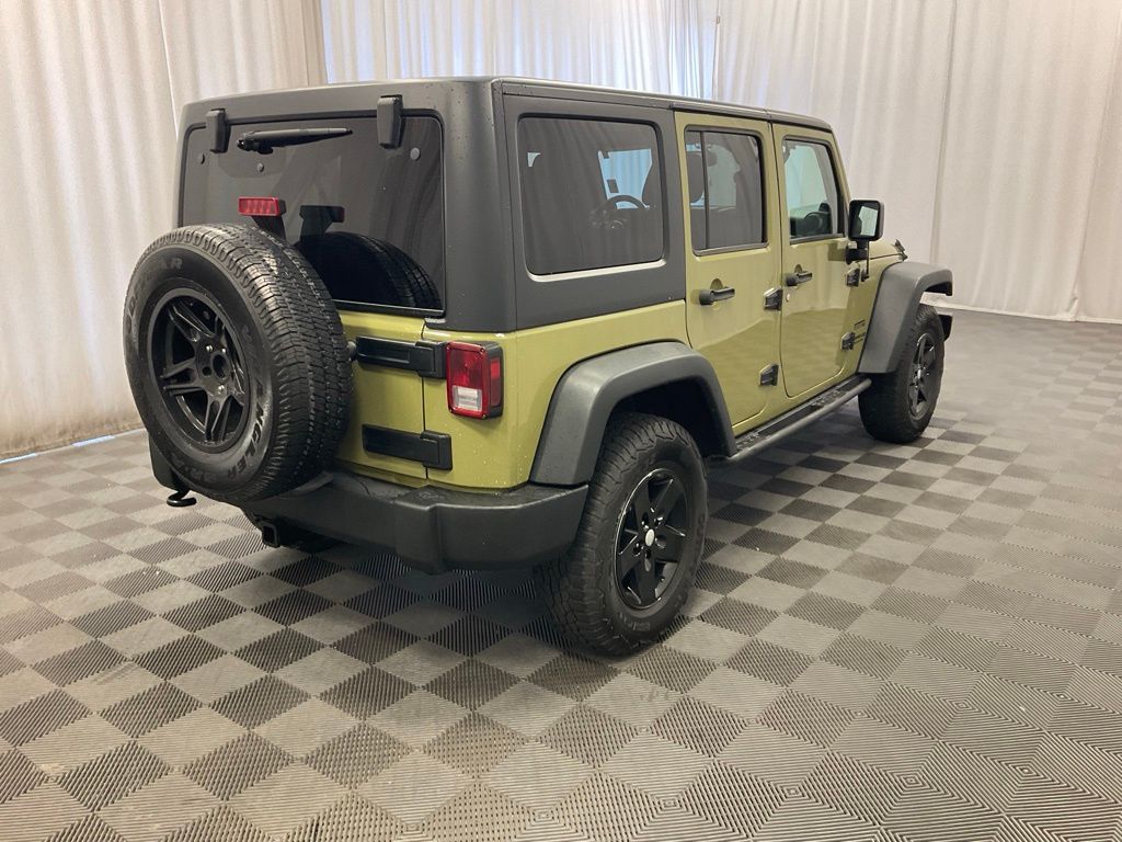 Used 2013 Jeep Wrangler Unlimited Sport with VIN 1C4BJWDG0DL690692 for sale in Moorhead, Minnesota