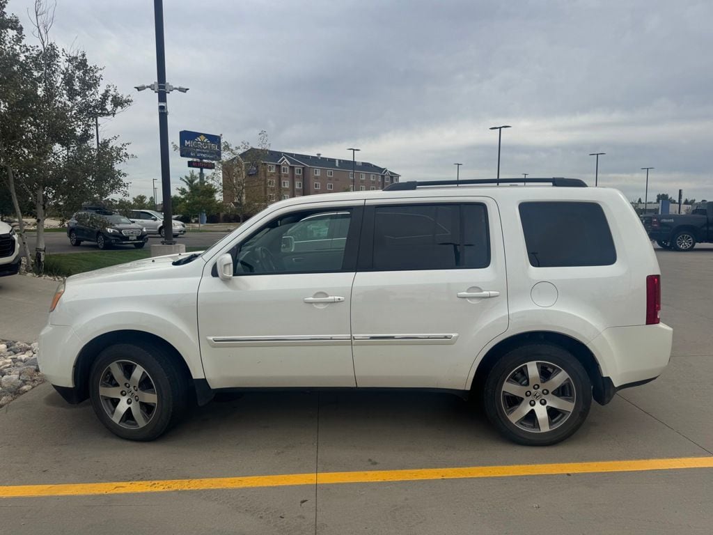 Used 2014 Honda Pilot Touring with VIN 5FNYF4H9XEB025623 for sale in Moorhead, Minnesota