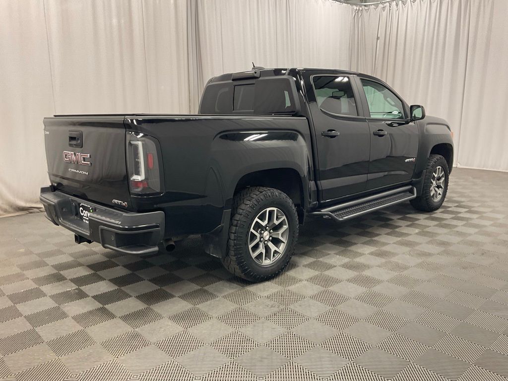 Used 2021 GMC Canyon AT4 with VIN 1GTG6FEN7M1102853 for sale in Moorhead, Minnesota