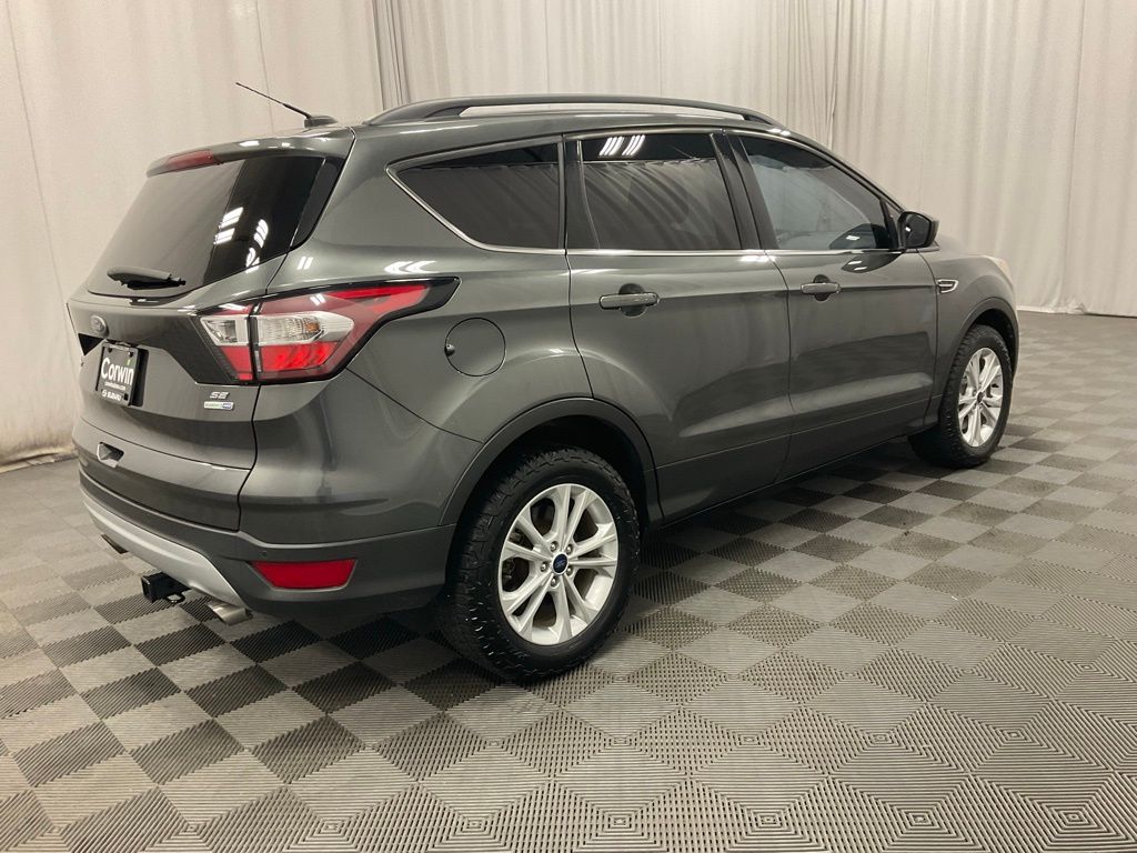 Used 2017 Ford Escape SE with VIN 1FMCU9GD1HUA39999 for sale in Moorhead, Minnesota