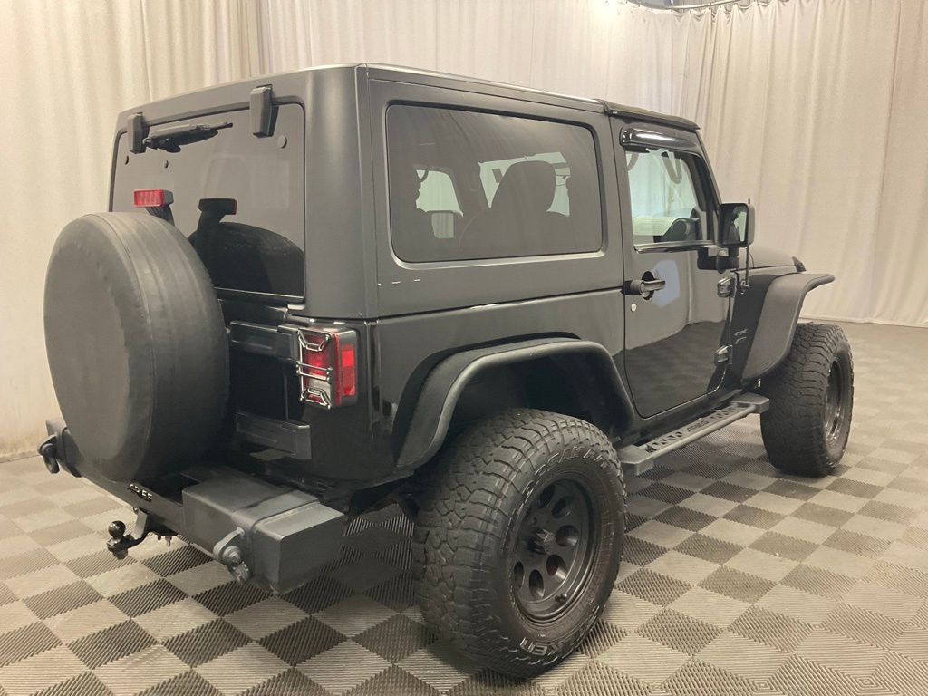 Used 2011 Jeep Wrangler Sport with VIN 1J4AA2D15BL619611 for sale in Moorhead, Minnesota