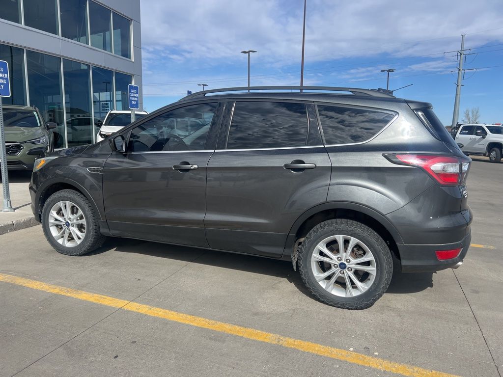Used 2017 Ford Escape SE with VIN 1FMCU9GD1HUA39999 for sale in Moorhead, Minnesota
