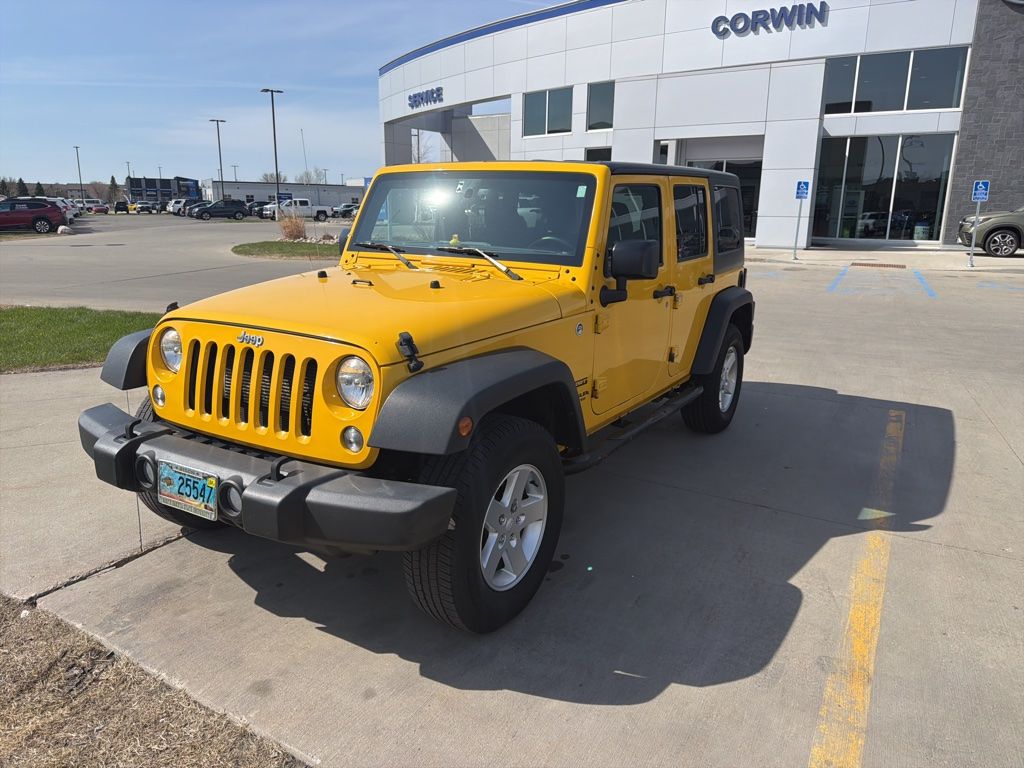Used 2015 Jeep Wrangler Unlimited Sport with VIN 1C4BJWDG0FL699668 for sale in Moorhead, Minnesota