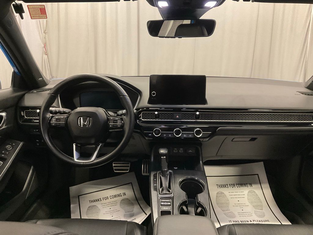 Used 2023 Honda Civic Hatchback Sport Touring with VIN 19XFL1H87PE005585 for sale in Moorhead, Minnesota