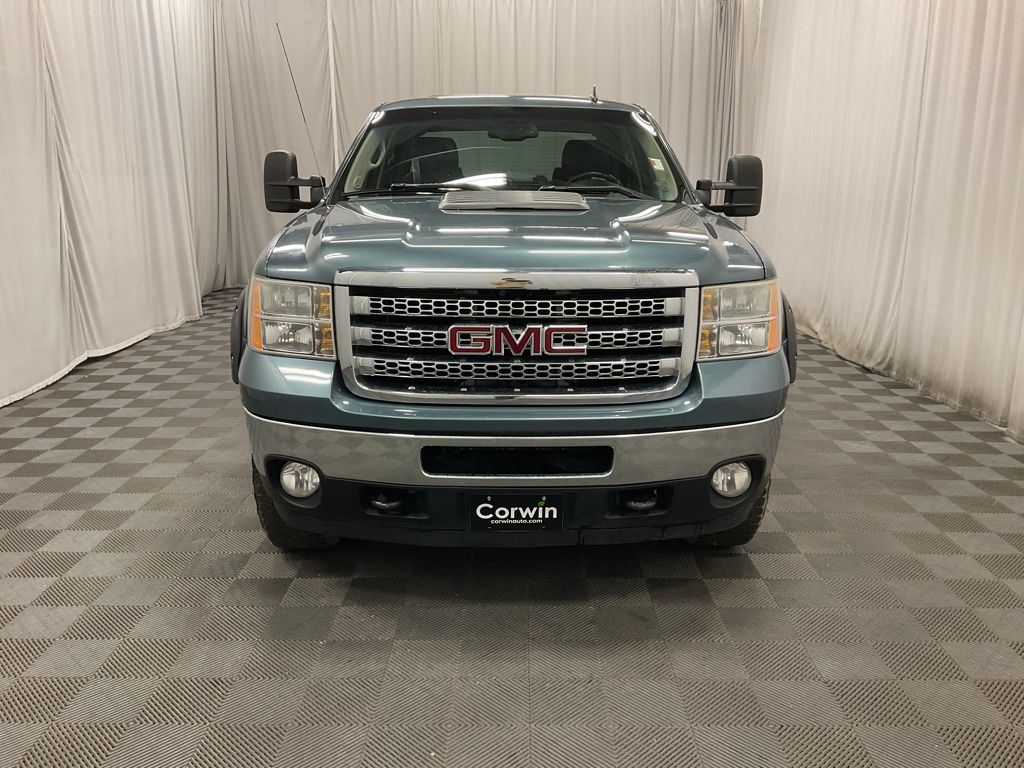 Used 2014 GMC Sierra 2500HD SLT with VIN 1GT121EG4EF183336 for sale in Moorhead, Minnesota