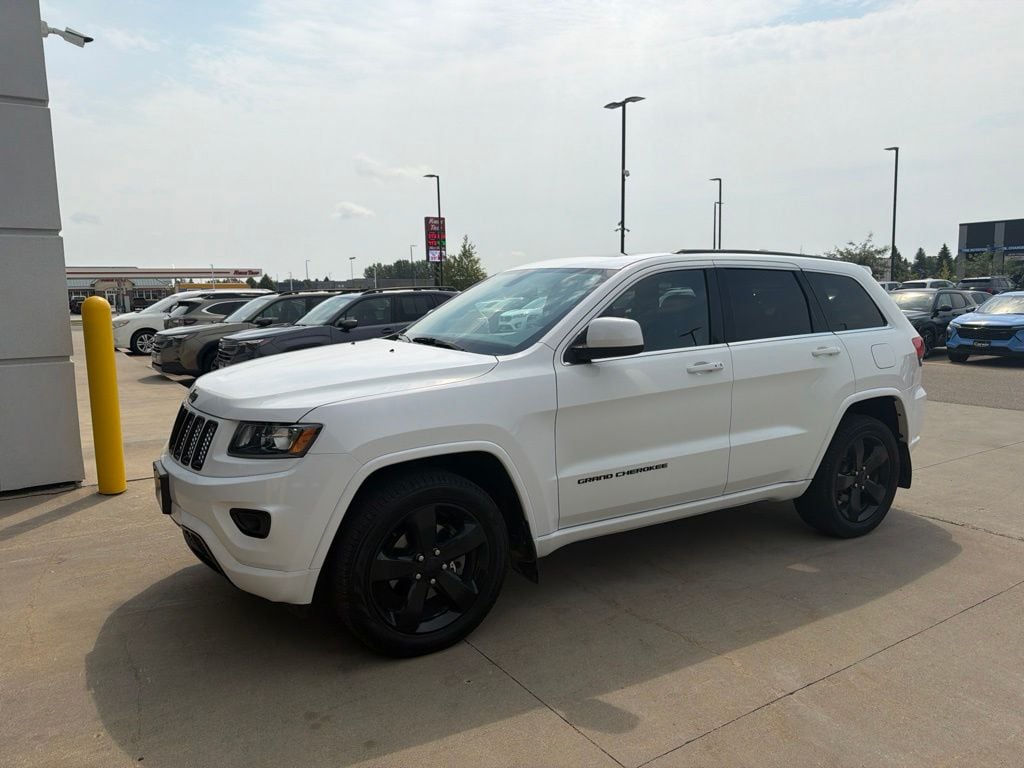 Used 2015 Jeep Grand Cherokee Altitude with VIN 1C4RJFAG9FC643392 for sale in Moorhead, Minnesota