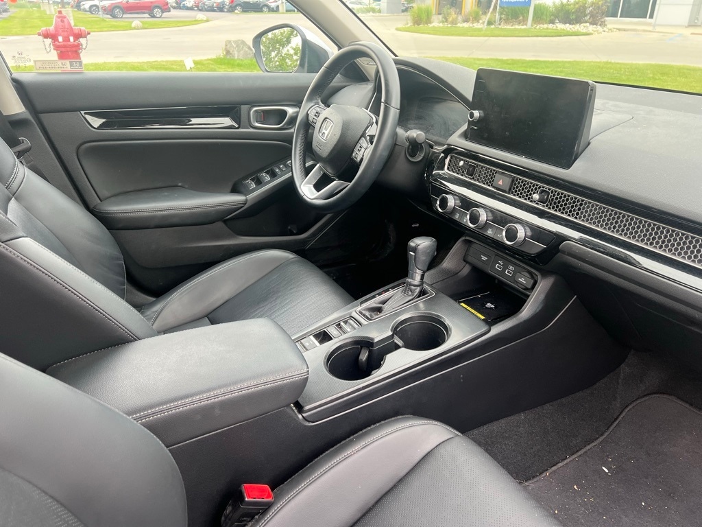 Used 2023 Honda Civic Touring with VIN 2HGFE1F98PH318589 for sale in Moorhead, Minnesota