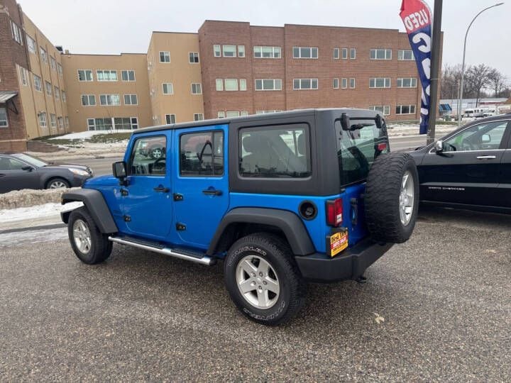 Used 2015 Jeep Wrangler Unlimited Sport with VIN 1C4BJWDG3FL683920 for sale in Moorhead, Minnesota