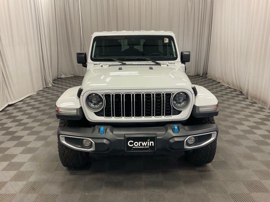 Used 2024 Jeep Wrangler 4xe Sahara 4XE with VIN 1C4RJXP69RW291857 for sale in Moorhead, Minnesota