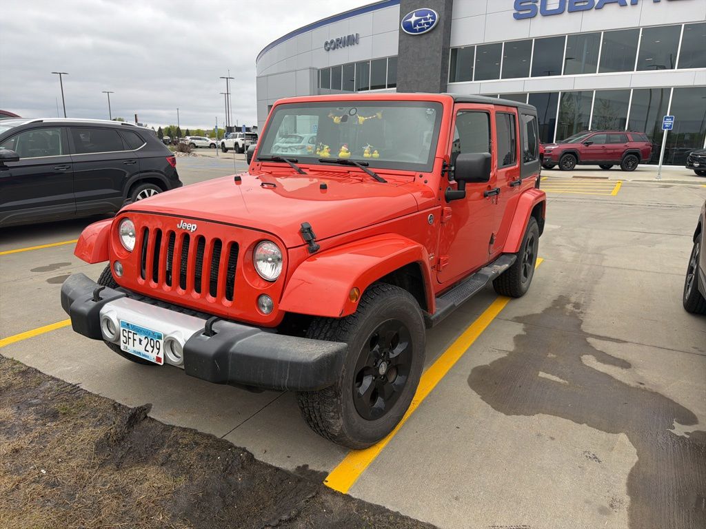 Used 2015 Jeep Wrangler Unlimited Sahara with VIN 1C4BJWEG6FL719288 for sale in Moorhead, Minnesota