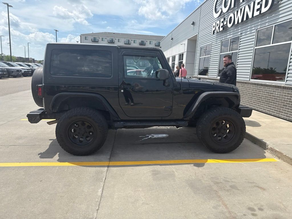 Used 2011 Jeep Wrangler Sport with VIN 1J4AA2D15BL619611 for sale in Moorhead, Minnesota