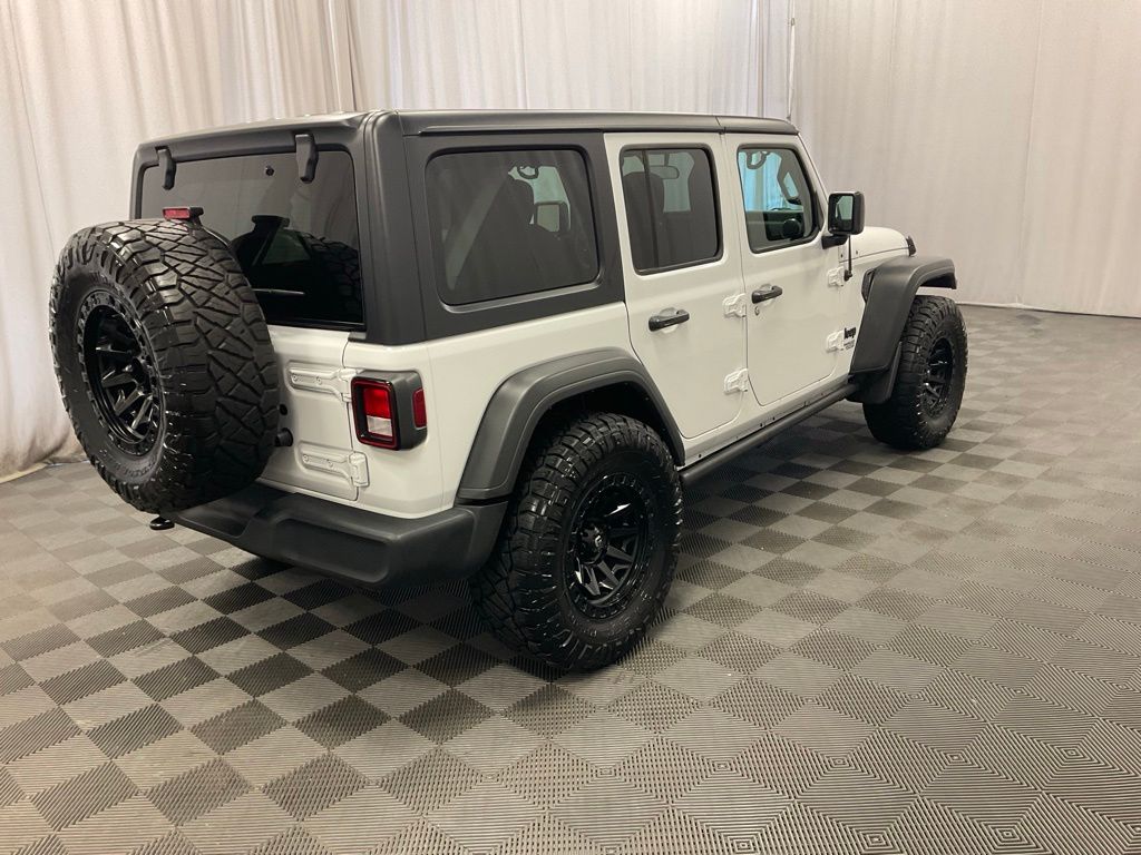 Used 2021 Jeep Wrangler Unlimited Sport S with VIN 1C4HJXDG9MW827482 for sale in Moorhead, Minnesota