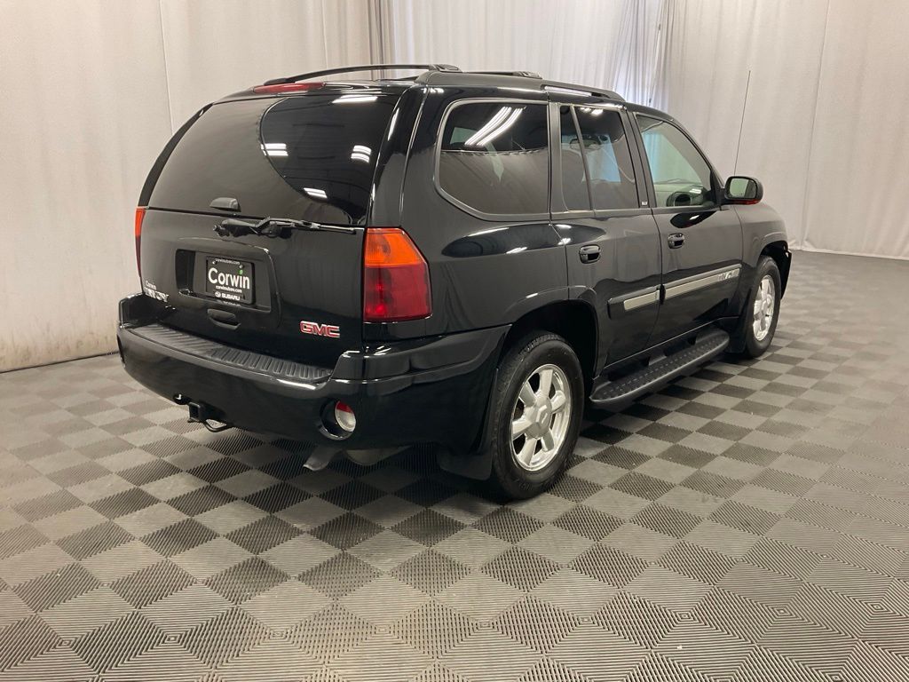 Used 2005 GMC Envoy  with VIN 1GKDT13S052342978 for sale in Moorhead, Minnesota
