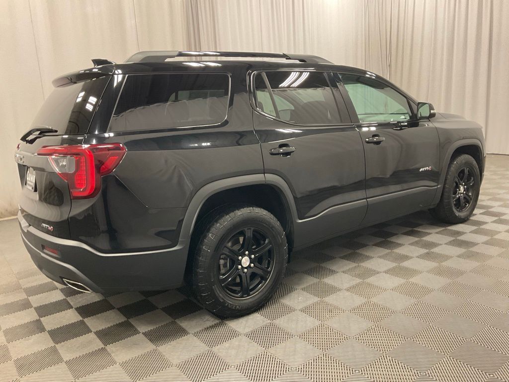 Used 2021 GMC Acadia AT4 with VIN 1GKKNLLS6MZ168238 for sale in Moorhead, Minnesota