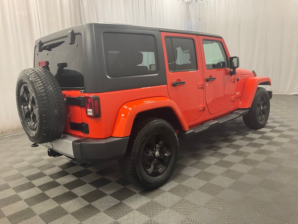 Used 2015 Jeep Wrangler Unlimited Sahara with VIN 1C4BJWEG6FL719288 for sale in Moorhead, Minnesota