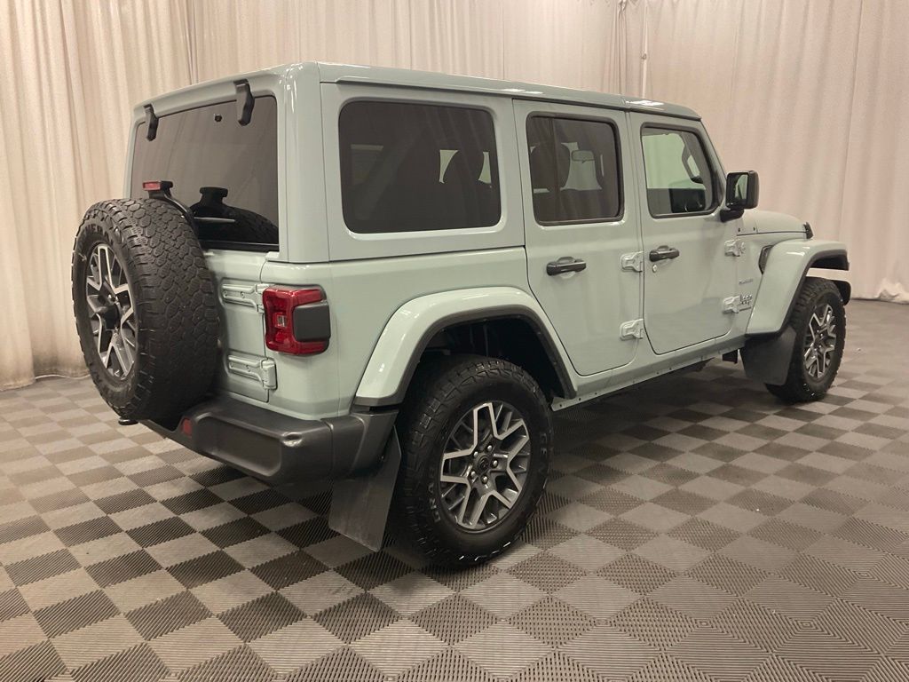 Used 2024 Jeep Wrangler 4-Door Sahara with VIN 1C4PJXEG3RW344572 for sale in Moorhead, Minnesota
