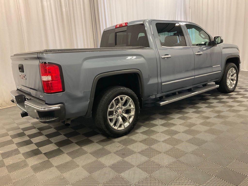 Used 2015 GMC Sierra 1500 SLT with VIN 3GTU2VEC9FG303925 for sale in Moorhead, Minnesota