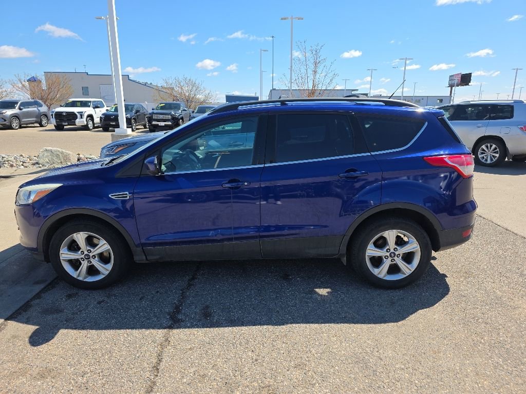 Used 2015 Ford Escape SE with VIN 1FMCU9G97FUB49433 for sale in Fargo, ND