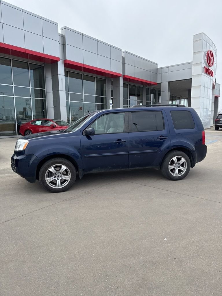 Used 2013 Honda Pilot EX-L with VIN 5FNYF4H6XDB025710 for sale in Fargo, ND